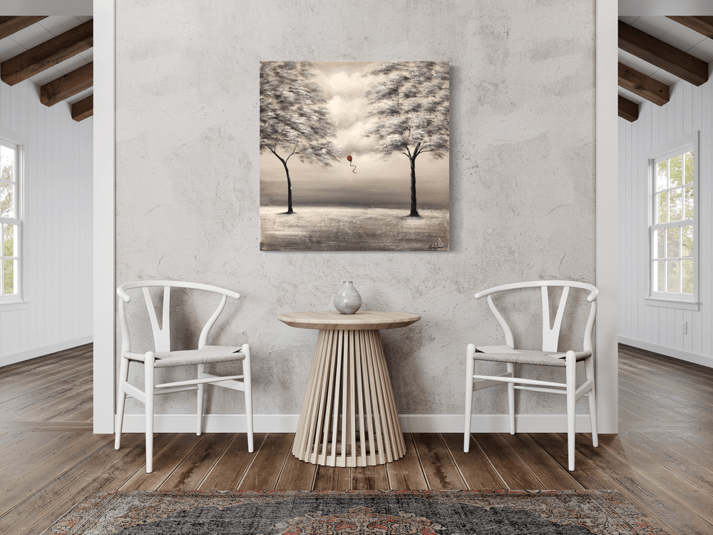 En tavla med röd ballong